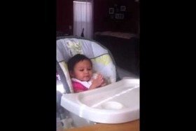 Zoe eating with a spoon